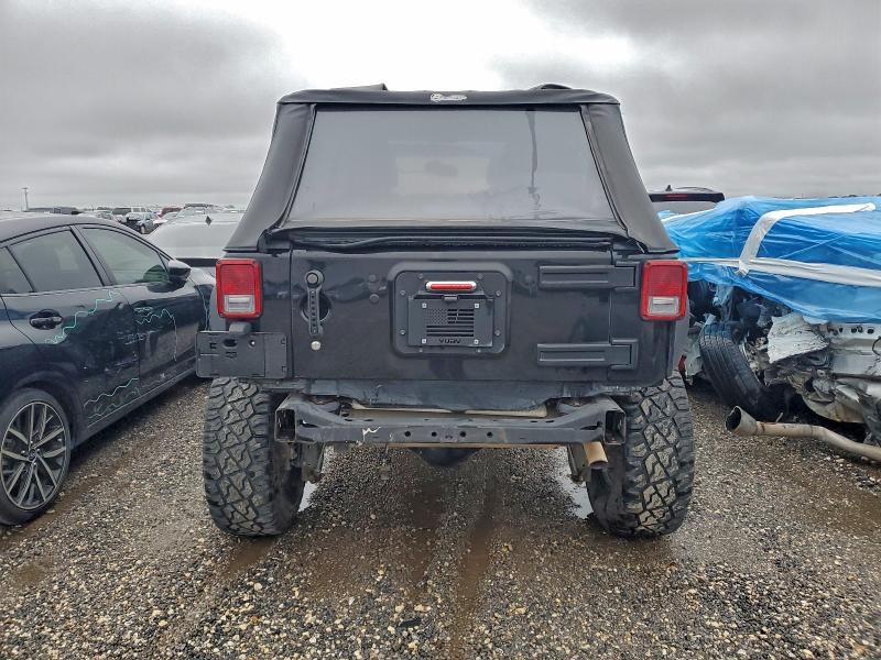 Foto 6 de la subasta – 2016 JEEP WRANGLER U con VIN 1C4BJWDG2GL160938