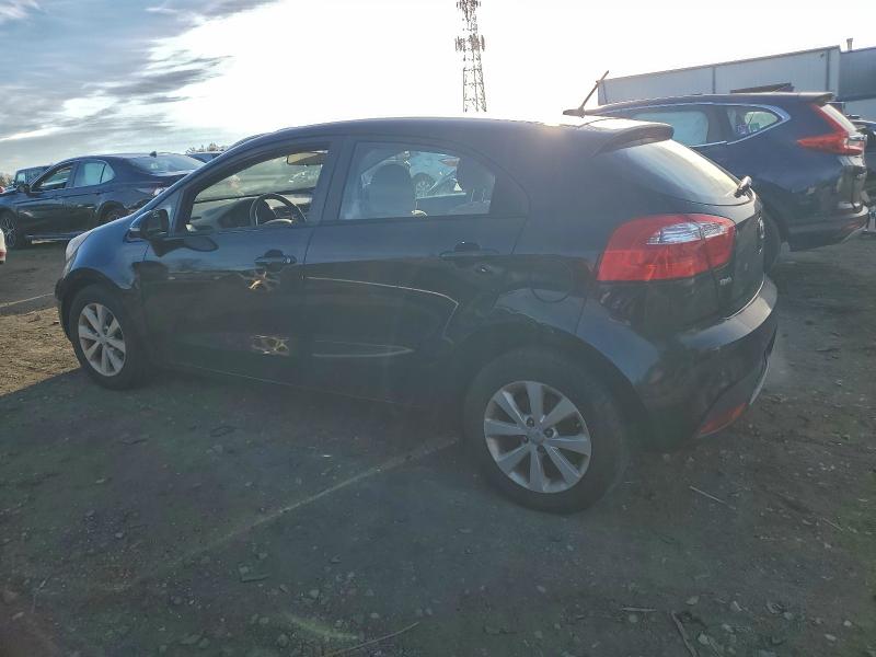 Photo 2 from auction – 2014 KIA RIO EX with VIN KNADN5A37E6376527