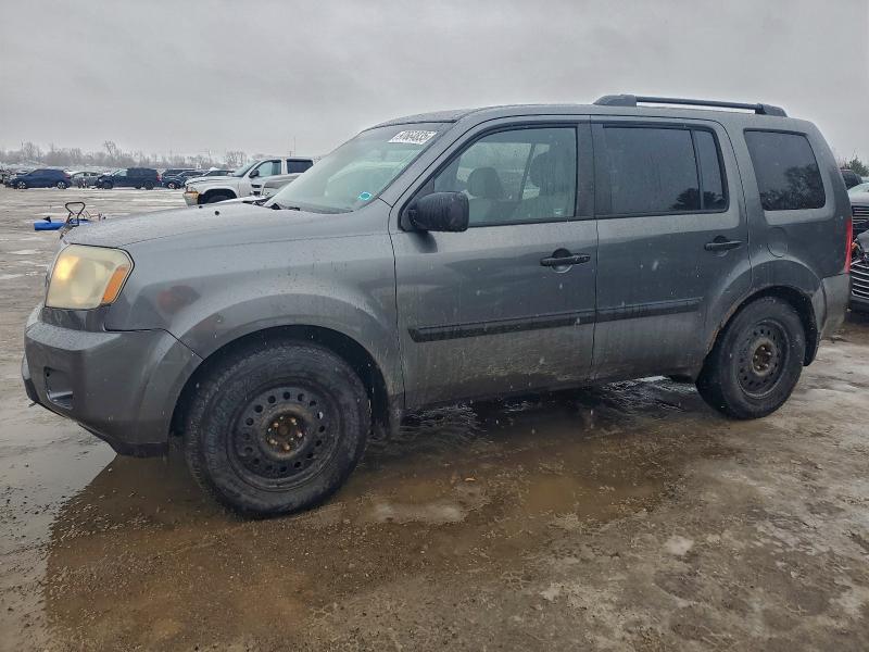 HONDA PILOT LX 2011 with VIN 5FNYF4H21BB501868 - Photo from auction