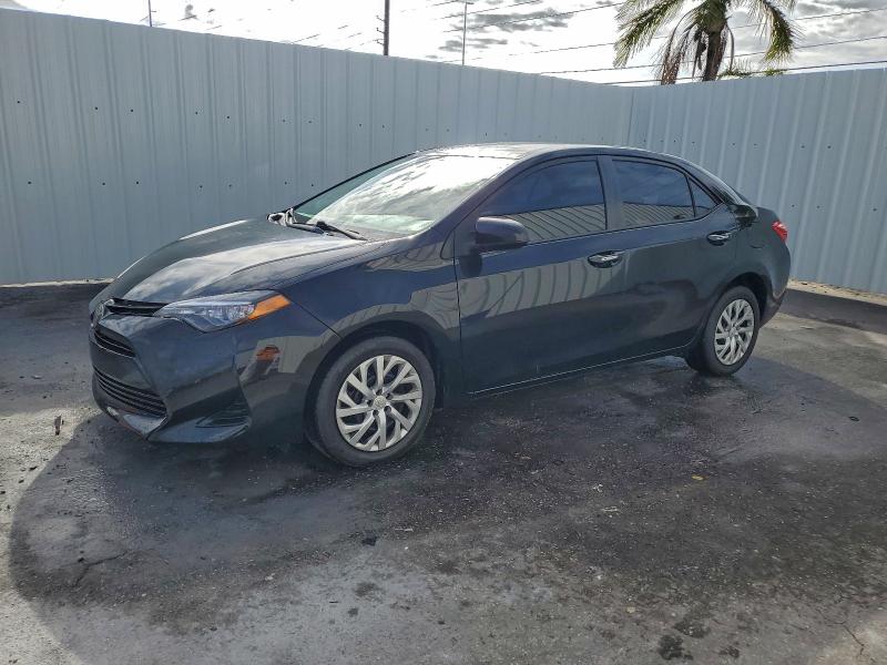 TOYOTA COROLLA L 2018 with VIN 5YFBURHE7JP842939 - Photo from auction
