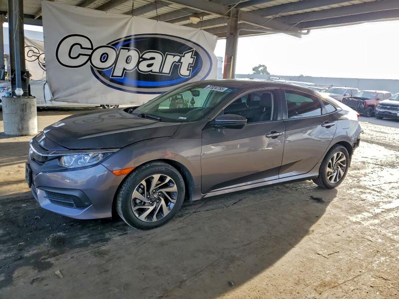 HONDA CIVIC EX 2017 with VIN 19XFC2F7XHE215969 - Photo from auction