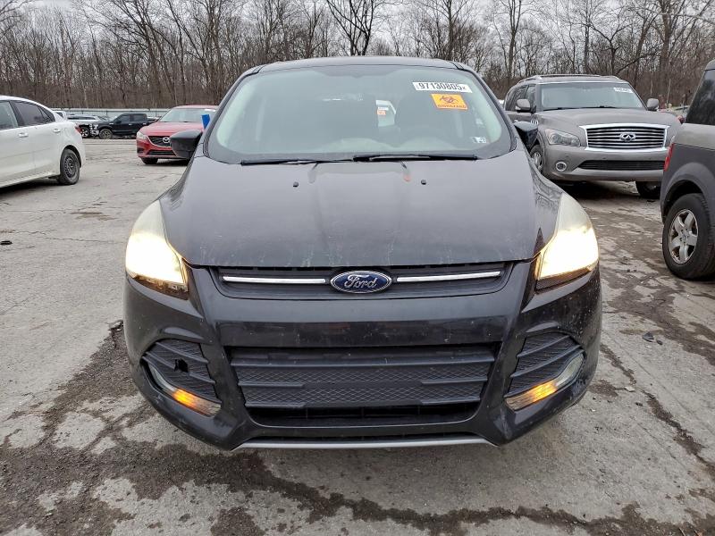 Photo 5 from auction – 2014 FORD ESCAPE with VIN 1FMCU9GX6EUD64010