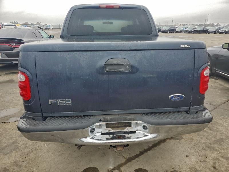 Photo 6 from auction – 2001 FORD F150 SUPER with VIN 1FTRW07W91KB10549