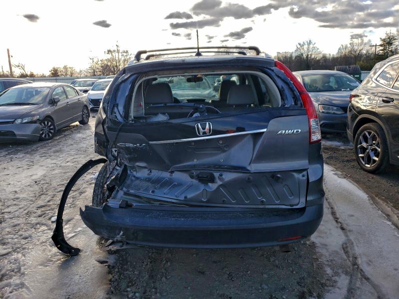 Photo 6 from auction – 2014 HONDA CR-V EXL with VIN 2HKRM4H78EH600733