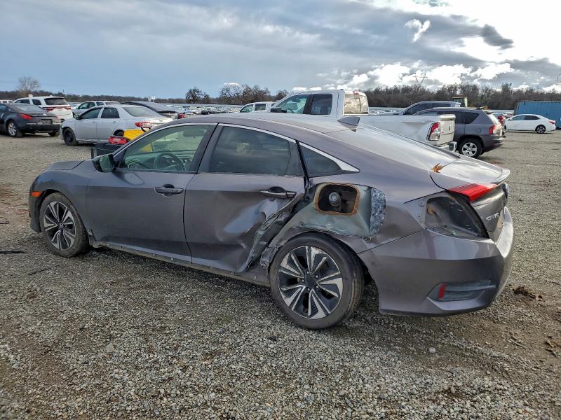 Photo 2 from auction – 2018 HONDA CIVIC EX with VIN JHMFC1F37JX010282