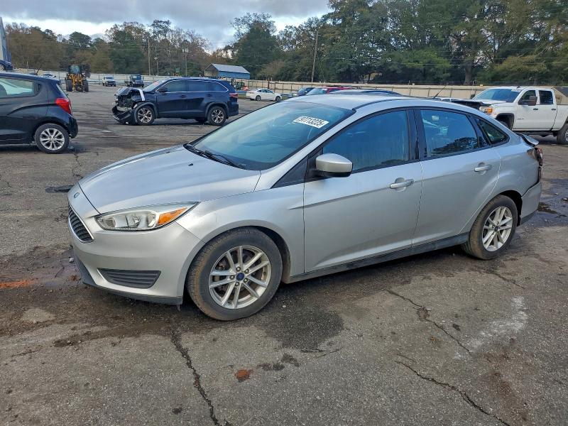 FORD FOCUS SE 2018 with VIN 1FADP3F20JL202060 - Photo from auction