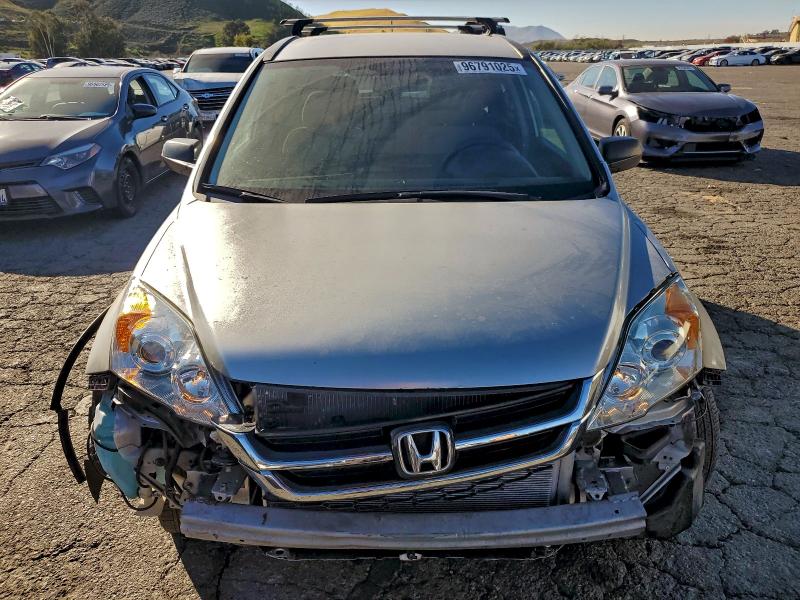 Photo 5 from auction – 2011 HONDA CR-V SE with VIN JHLRE3H45BC015048