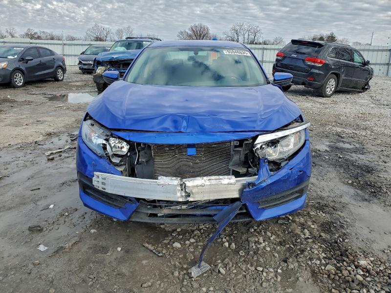 Photo 5 from auction – 2018 HONDA CIVIC LX with VIN 19XFC2F51JE040404