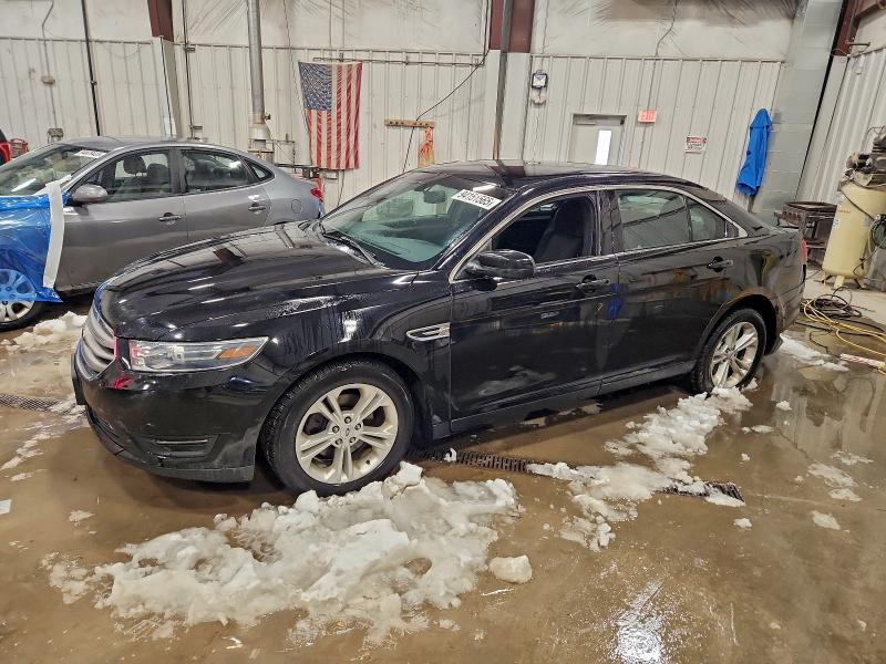 FORD TAURUS SEL 2016 with VIN 1FAHP2E81GG129154 - Photo from auction