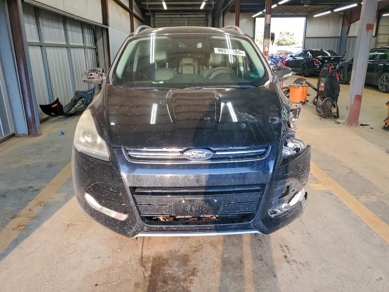 Photo 5 from auction – 2016 FORD ESCAPE with VIN 1FMCU9J9XGUB15352