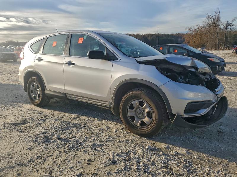 Photo 4 from auction – 2015 HONDA CR-V with VIN 3CZRM3H30FG715628