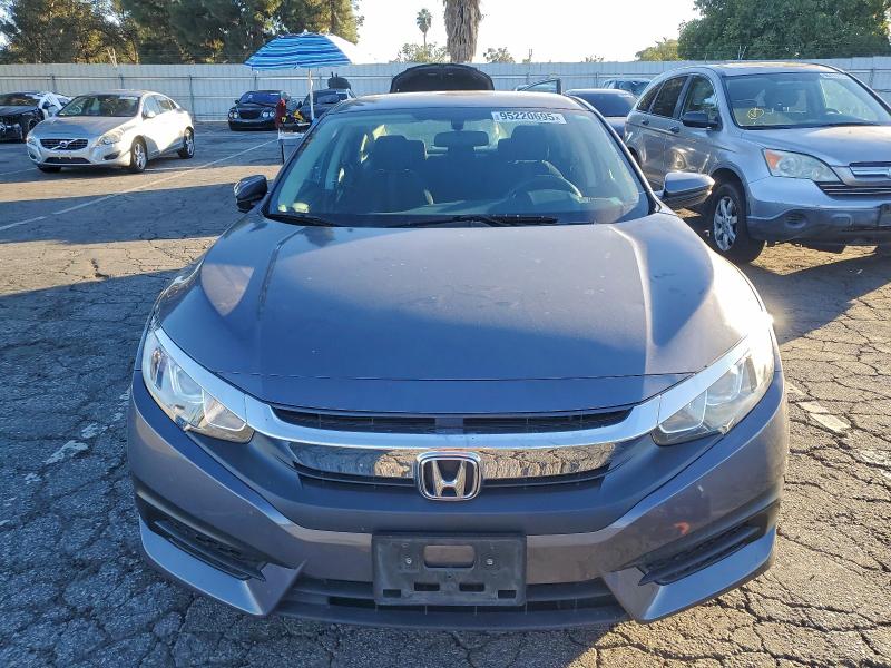 Photo 5 from auction – 2016 HONDA CIVIC LX with VIN 2HGFC2F50GH536096