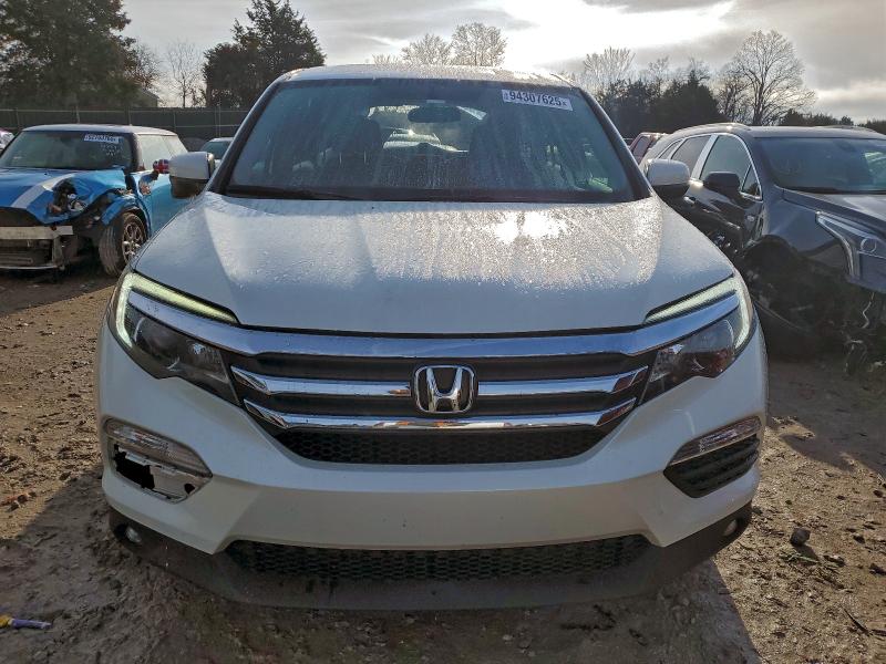 Photo 5 from auction – 2017 HONDA PILOT EX with VIN 5FNYF5H30HB006214