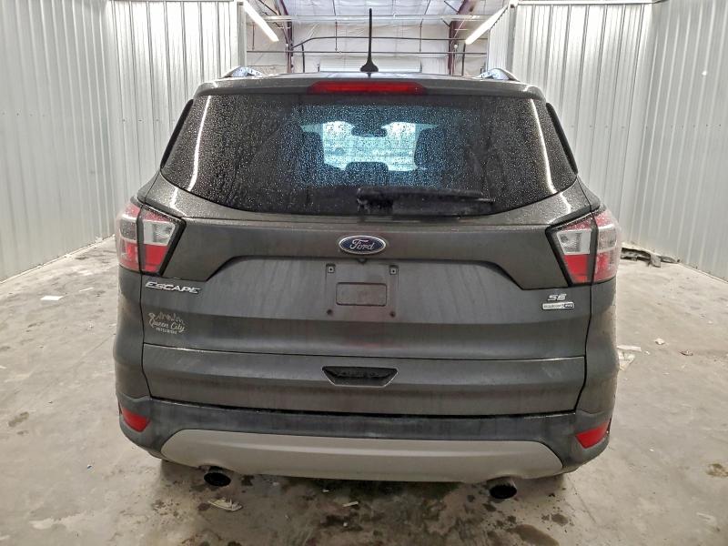 Photo 6 from auction – 2018 FORD ESCAPE SE with VIN 1FMCU9GD9JUA43868