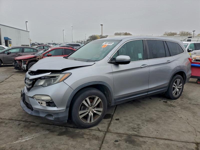 HONDA PILOT EX 2017 with VIN 5FNYF5H33HB001380 - Photo from auction