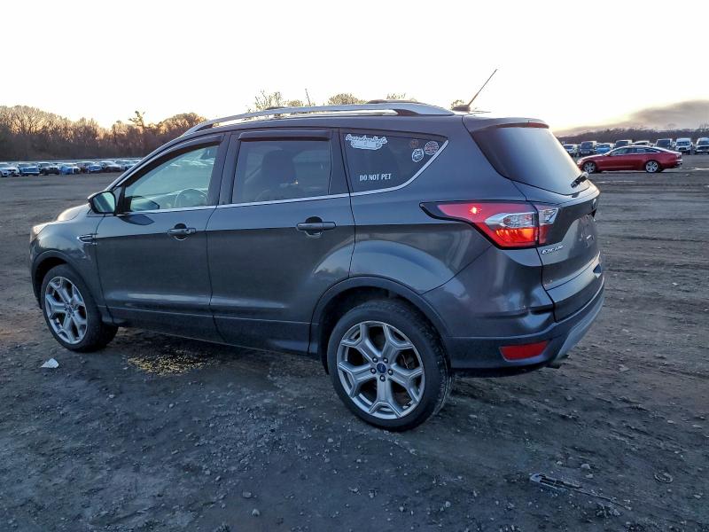 Photo 2 from auction – 2017 FORD ESCAPE TIT with VIN 1FMCU9JD9HUE56506