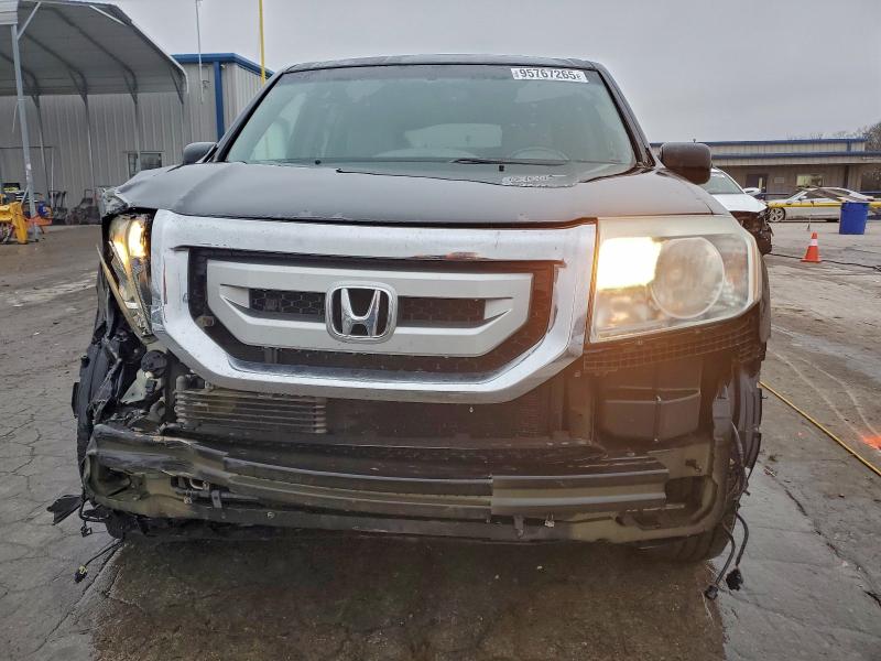 Фото 5 с аукциона – 2011 HONDA PILOT TOUR с VIN 5FNYF3H91BB010160