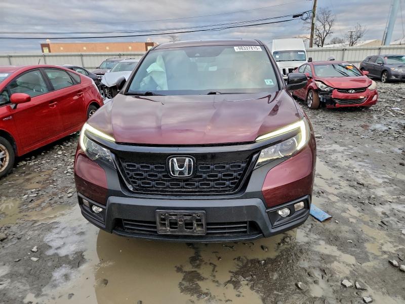 Photo 5 from auction – 2021 HONDA PASSPORT E with VIN 5FNYF8H52MB027823