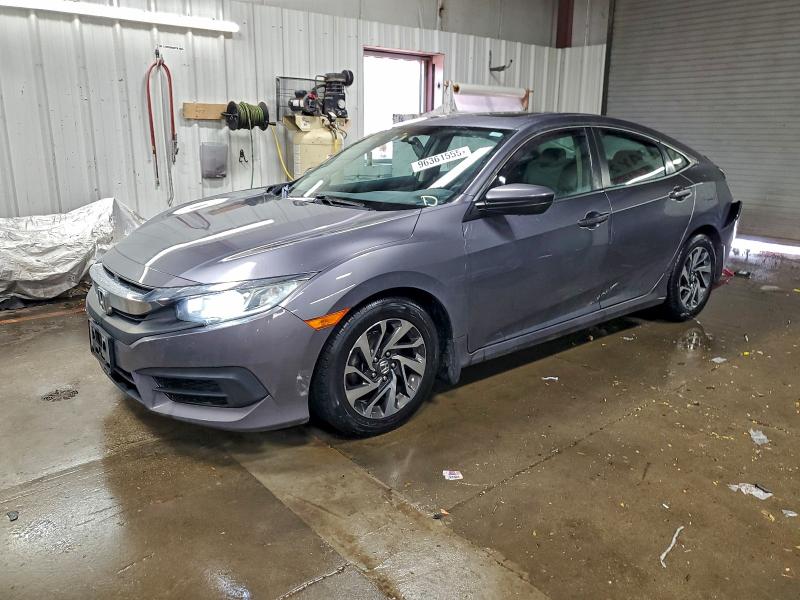 HONDA CIVIC EX 2017 con VIN 19XFC2F76HE079551 - Foto de la subasta