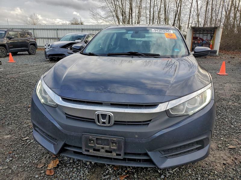 Photo 5 from auction – 2016 HONDA CIVIC EX with VIN 19XFC2F75GE043249