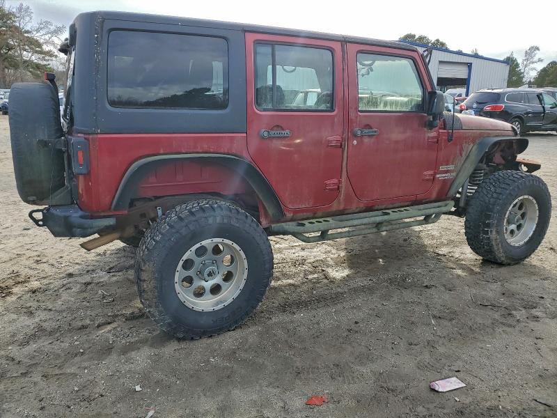 Photo 3 from auction – 2011 JEEP WRANGLER U with VIN 1J4BA3H14BL526504