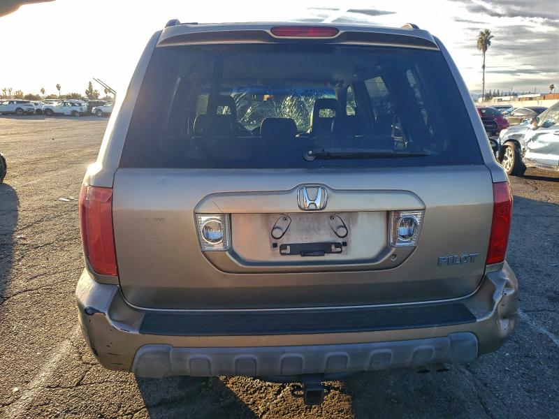 Фото 6 с аукциона – 2004 HONDA PILOT с VIN 2HKYF18594H612410