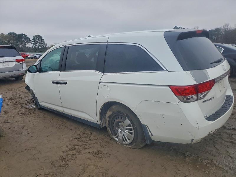 Photo 2 from auction – 2014 HONDA ODYSSEY LX with VIN 5FNRL5H28EB104732