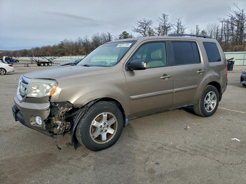 Photo 1 from auction – 2009 HONDA PILOT TOUR with VIN 5FNYF48939B022990