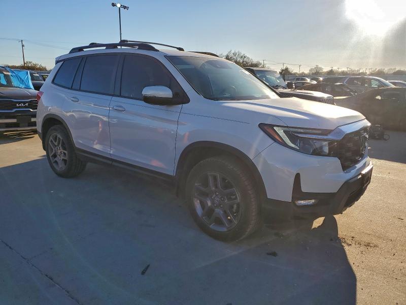 Photo 4 from auction – 2023 HONDA PASSPORT E with VIN 5FNYF8H55PB035497