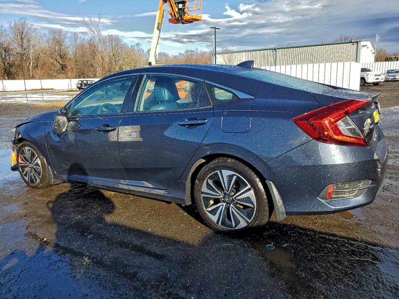 Photo 2 from auction – 2017 HONDA CIVIC EX with VIN 19XFC1F31HE200493