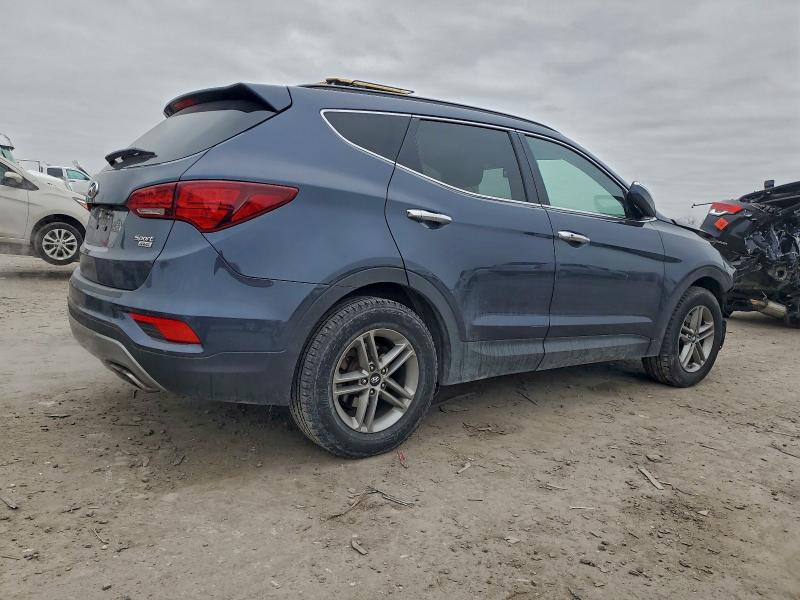 Photo 3 from auction – 2017 HYUNDAI SANTA FE S with VIN 5NMZUDLB6HH015646