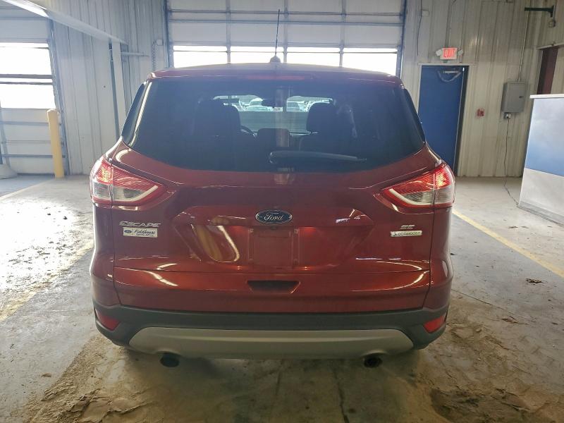 Photo 6 from auction – 2016 FORD ESCAPE with VIN 1FMCU0GX3GUB12617