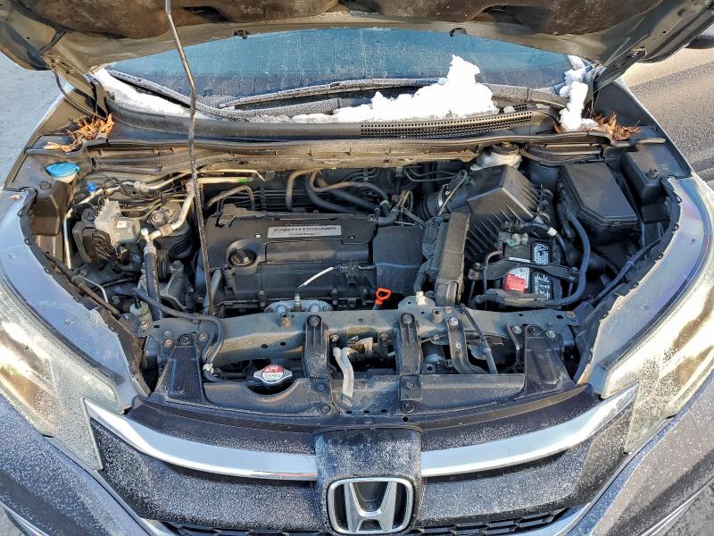Photo 12 from auction – 2015 HONDA CR-V with VIN 2HKRM4H56FH649087