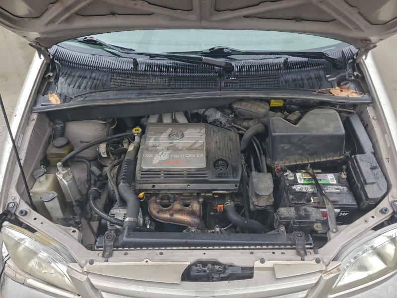 Photo 12 from auction – 2002 TOYOTA SIENNA LE with VIN 4T3ZF13C22U461703