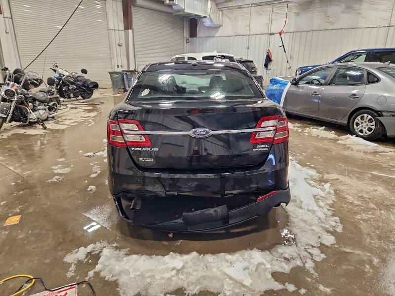 Photo 6 from auction – 2016 FORD TAURUS SEL with VIN 1FAHP2E81GG129154