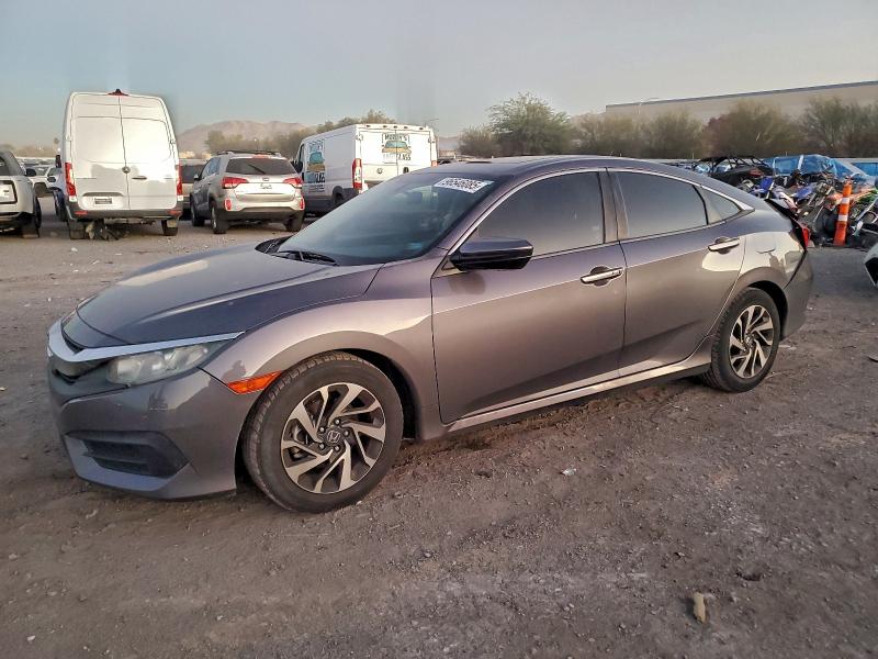 Photo 1 from auction – 2018 HONDA CIVIC EX with VIN 19XFC2F76JE003415