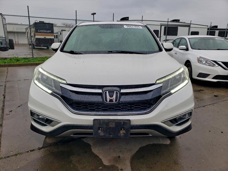 Photo 5 from auction – 2015 HONDA CR-V EXL with VIN 5J6RM4H78FL057701