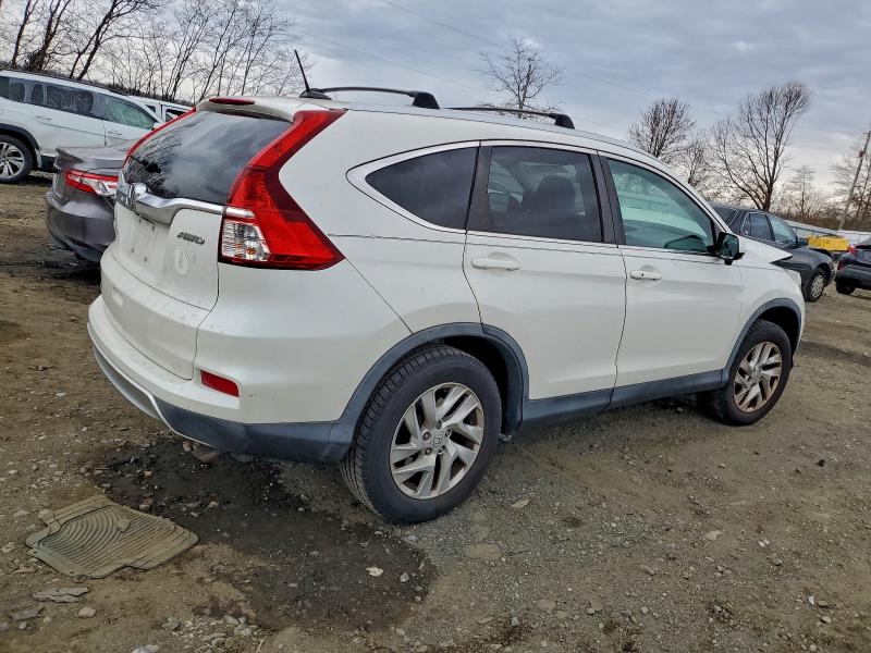 Photo 3 from auction – 2015 HONDA CR-V EXL with VIN 5J6RM4H71FL073934