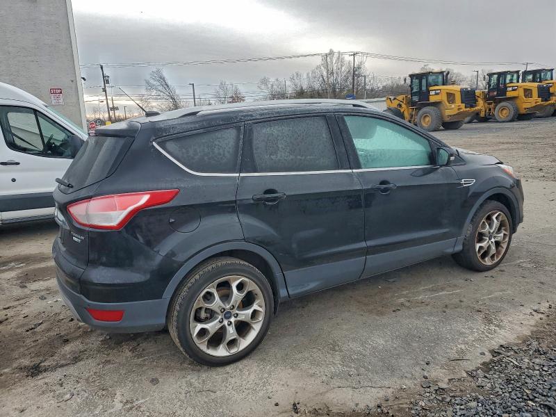 Photo 3 from auction – 2016 FORD ESCAPE TIT with VIN 1FMCU9J98GUB42226