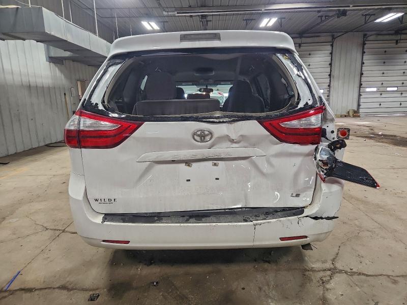 Photo 6 from auction – 2015 TOYOTA SIENNA LE with VIN 5TDKK3DC5FS664650