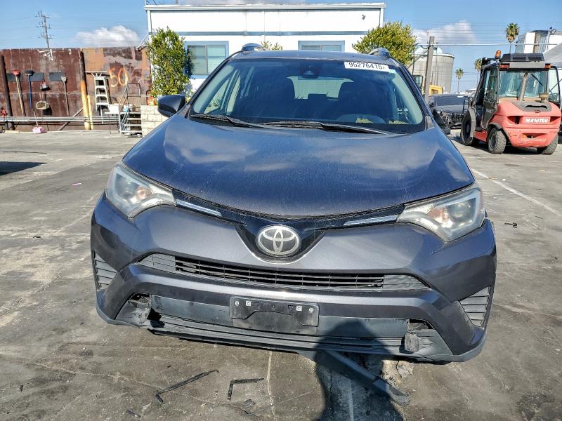 Photo 5 from auction – 2017 TOYOTA RAV4 LE with VIN JTMZFREV7HJ704331