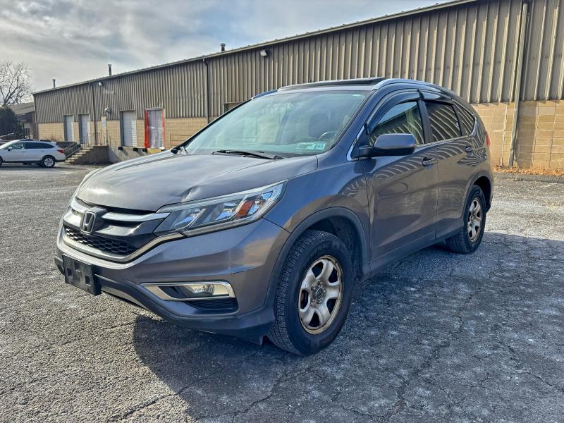 Photo 2 from auction – 2015 HONDA CR-V EXL with VIN 2HKRM4H76FH661192