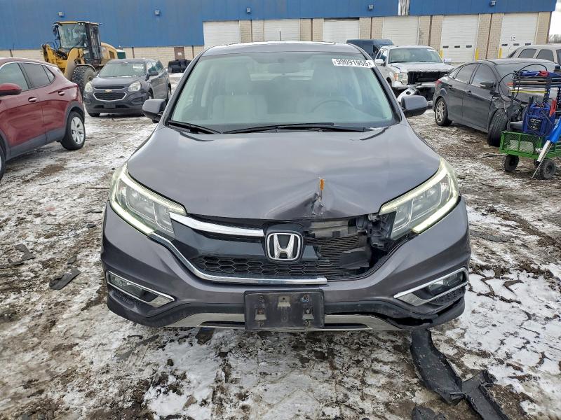 Photo 5 from auction – 2015 HONDA CR-V EX with VIN 2HKRM4H54FH683061