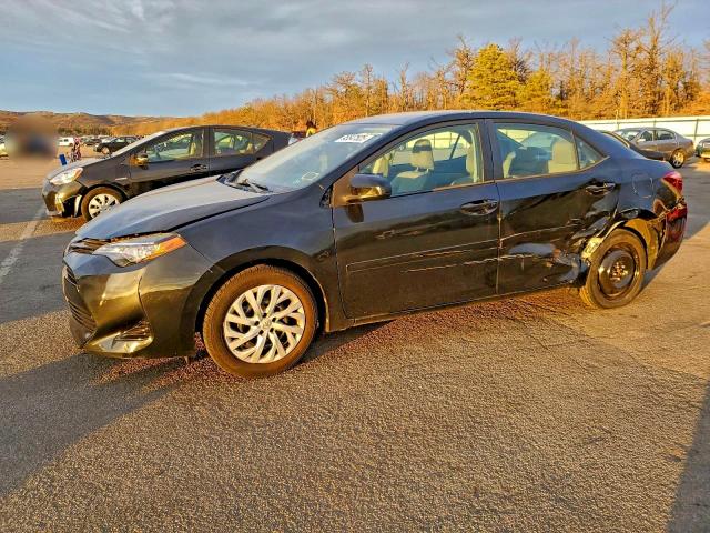 TOYOTA COROLLA L 2017 with VIN 2T1BURHE5HC827091 - Photo from auction