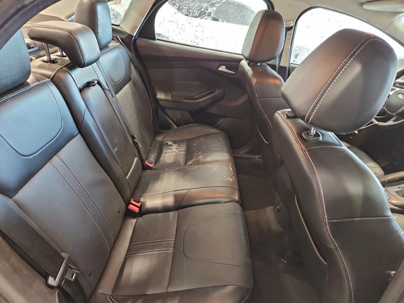 Photo 10 from auction – 2014 FORD FOCUS TITA with VIN 1FADP3J26EL338030