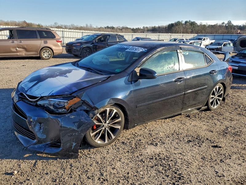 TOYOTA COROLLA L 2018 with VIN 5YFBURHE1JP811993 - Photo from auction