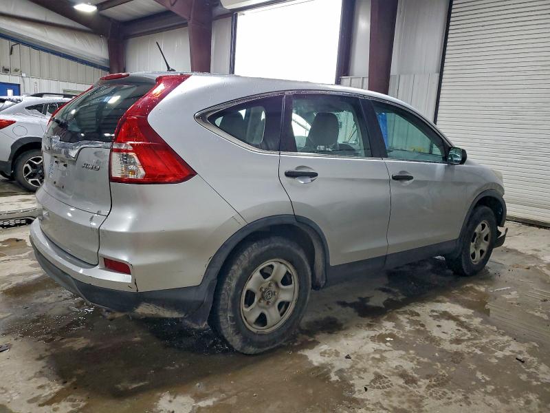Photo 3 from auction – 2015 HONDA CR-V LX with VIN 5J6RM4H31FL075048