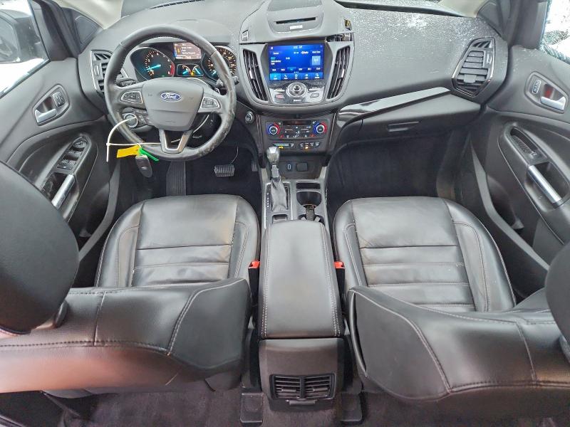 Photo 8 from auction – 2017 FORD ESCAPE TIT with VIN 1FMCU9J97HUC24143
