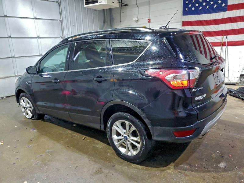 Photo 2 from auction – 2017 FORD ESCAPE SE with VIN 1FMCU9GD6HUE50685