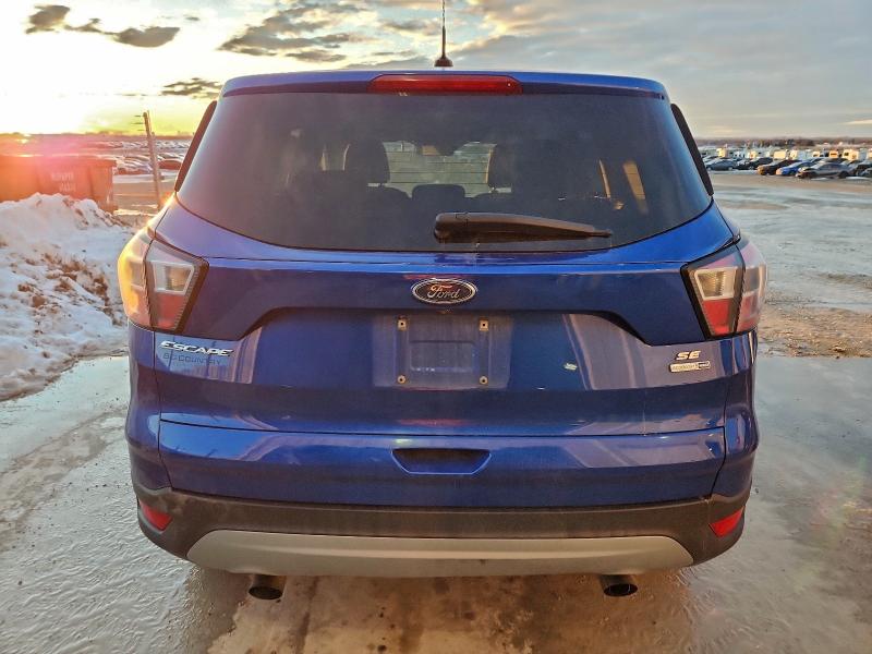 Photo 6 from auction – 2017 FORD ESCAPE with VIN 1FMCU9GD6HUC79064